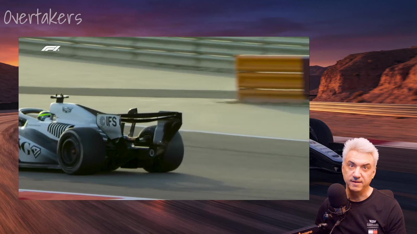 Cadillac F1 car at speed on a Grand Prix circuit